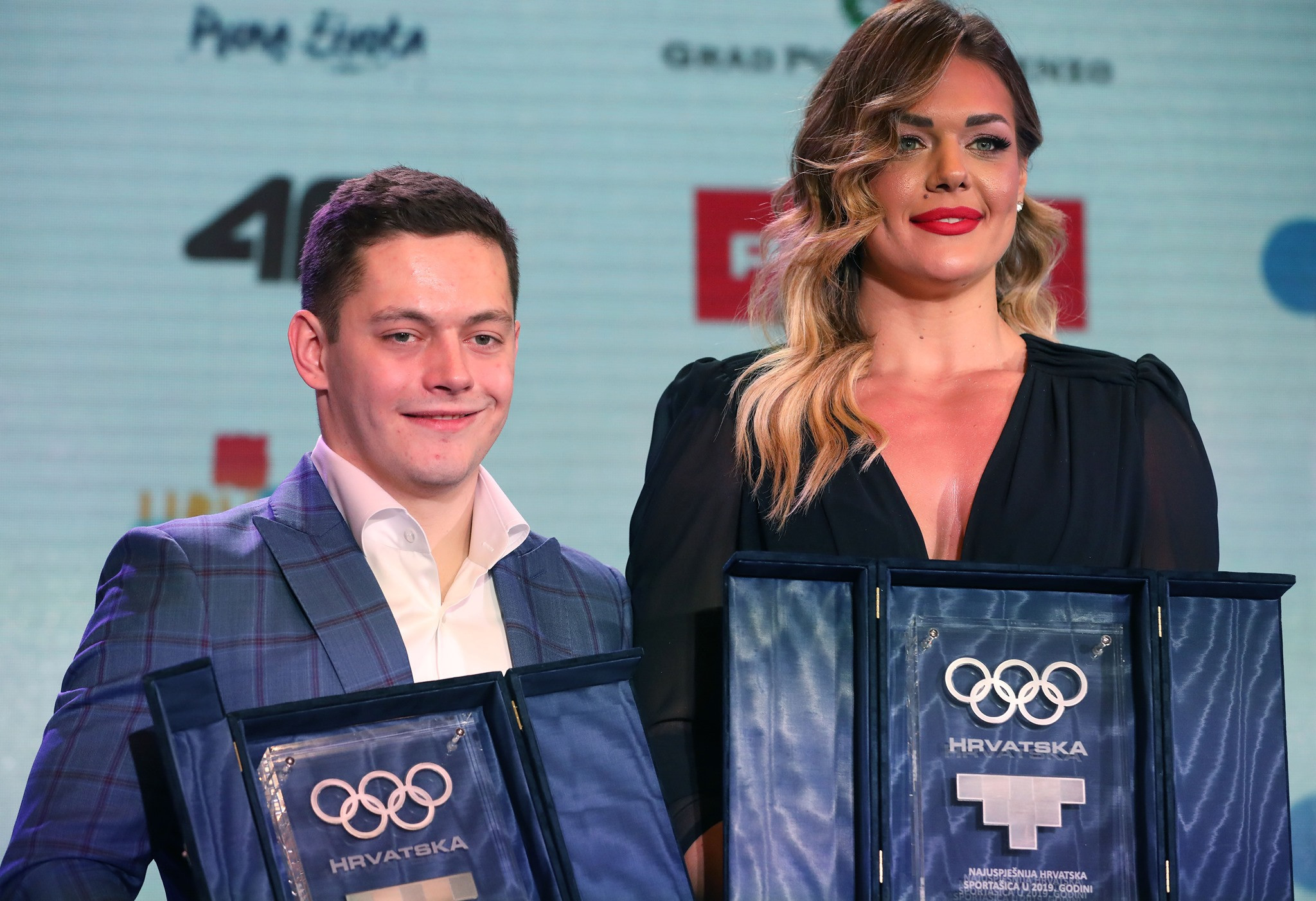 Discus thrower Sandra Perković, right, and gymnast Tin Srbic, left, won the individual honours at the recent Croatian Olympic Committee athlete of the year awards ©HOO