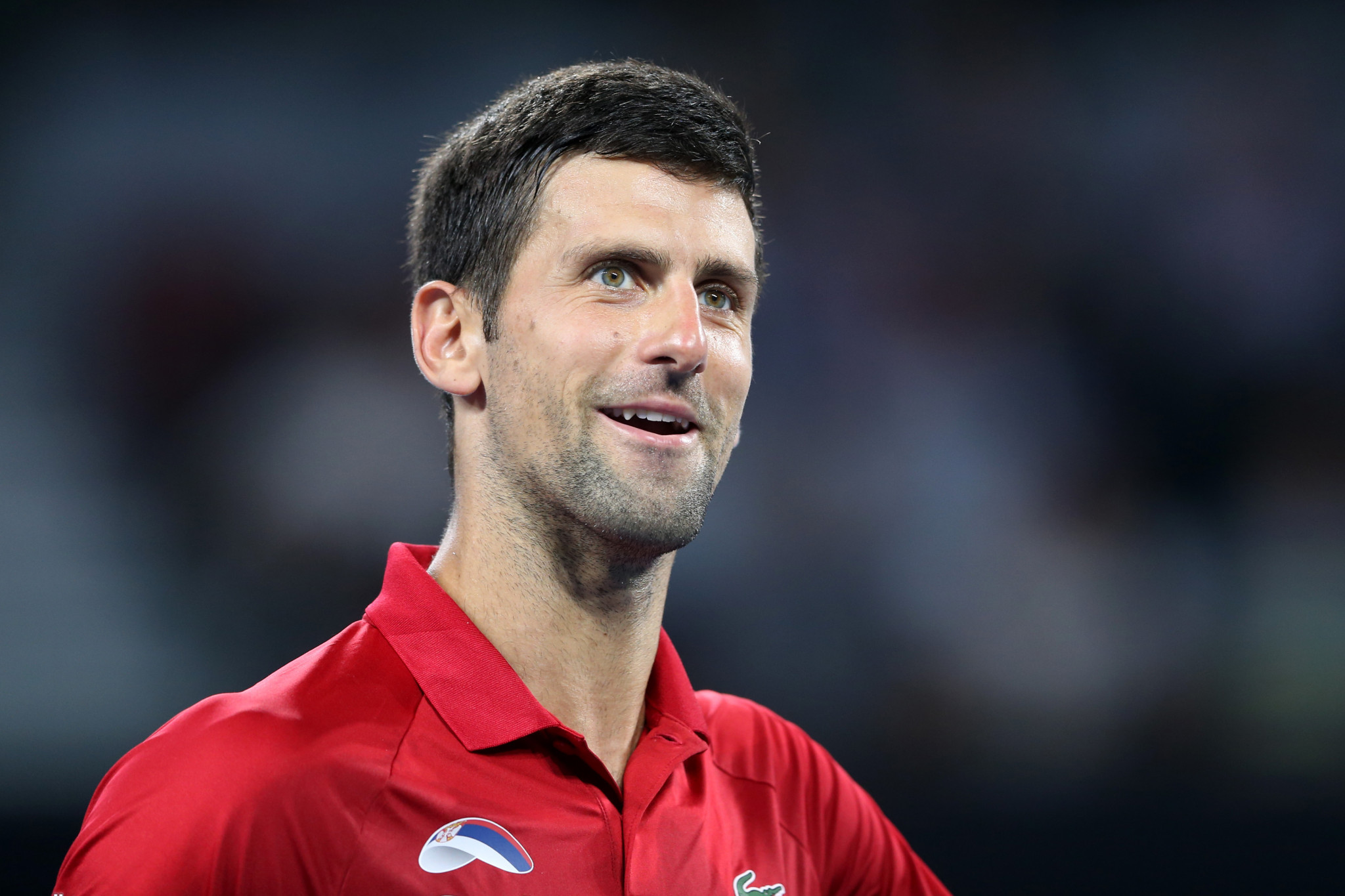 Djokovic double helps Serbia to last eight at ATP Cup