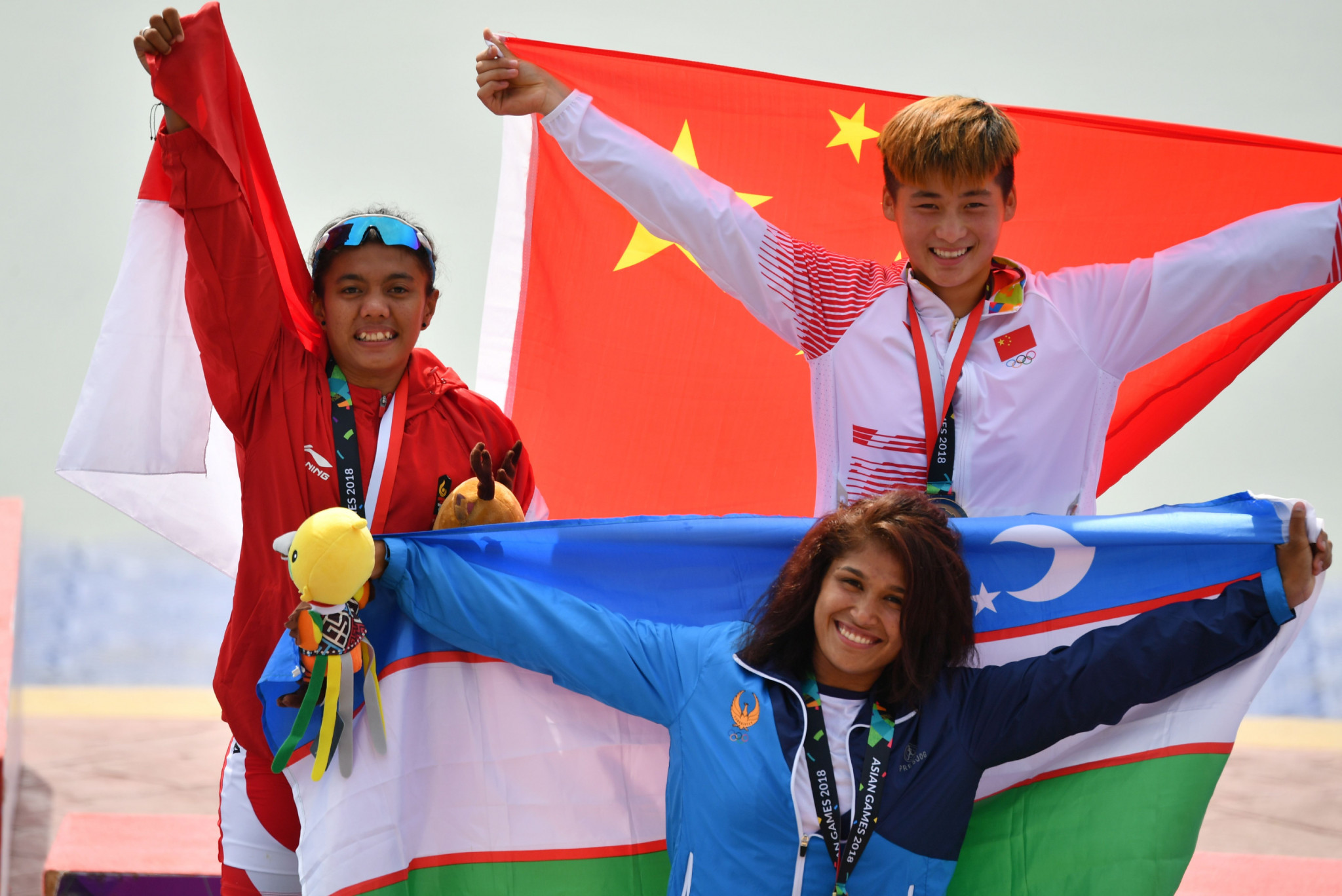 Dilnoza Rakhmatov, pictured centre after winning canoe sprint bronze at the 2018 Asian Games, has been named Uzbekistan's Female Athlete of 2019 at the end of a year where she earned world bronze in the C2-200m doubles event.