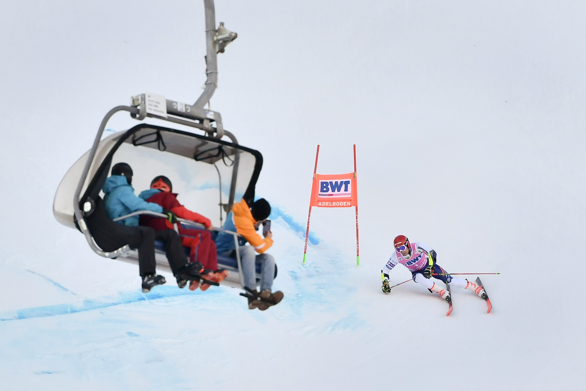 Zan Kranjec of Slovenia was watched by spectators on a ski lift as he raced to a gold medal ©Getty Images