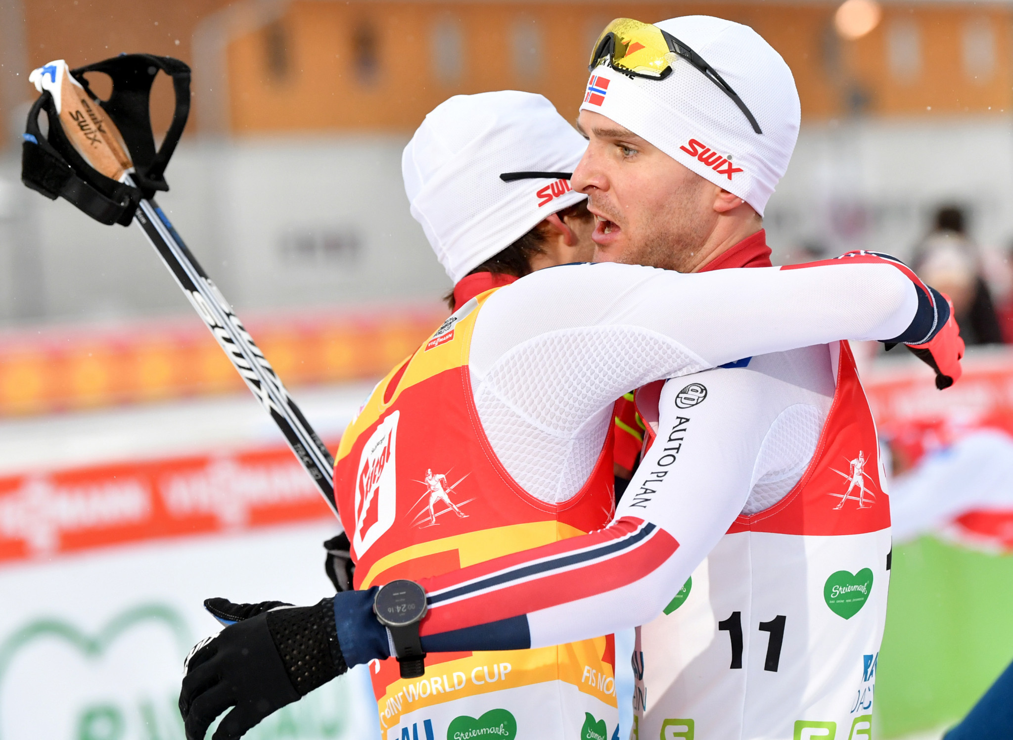 Norway's Jørgen Graabak and Jarl Magnus Riiber celebrate victory in the men's team sprint at the FIS Nordic Combined World Cup in Val di Fiemme ©Getty Images