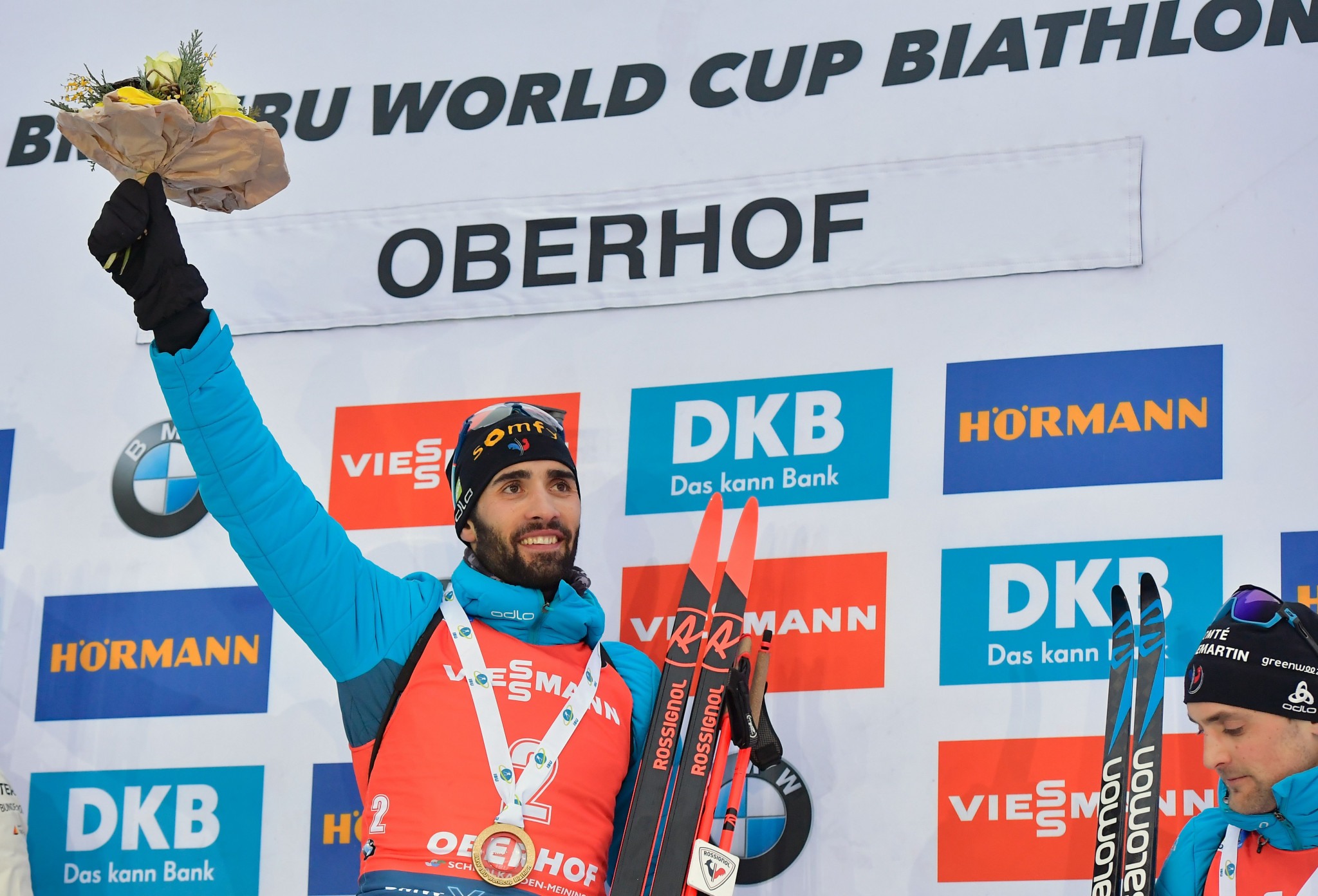 Martin Fourcade celebrates victory in the mass start 15km race at the IBU World Cup in Oberdorf ©Getty Images