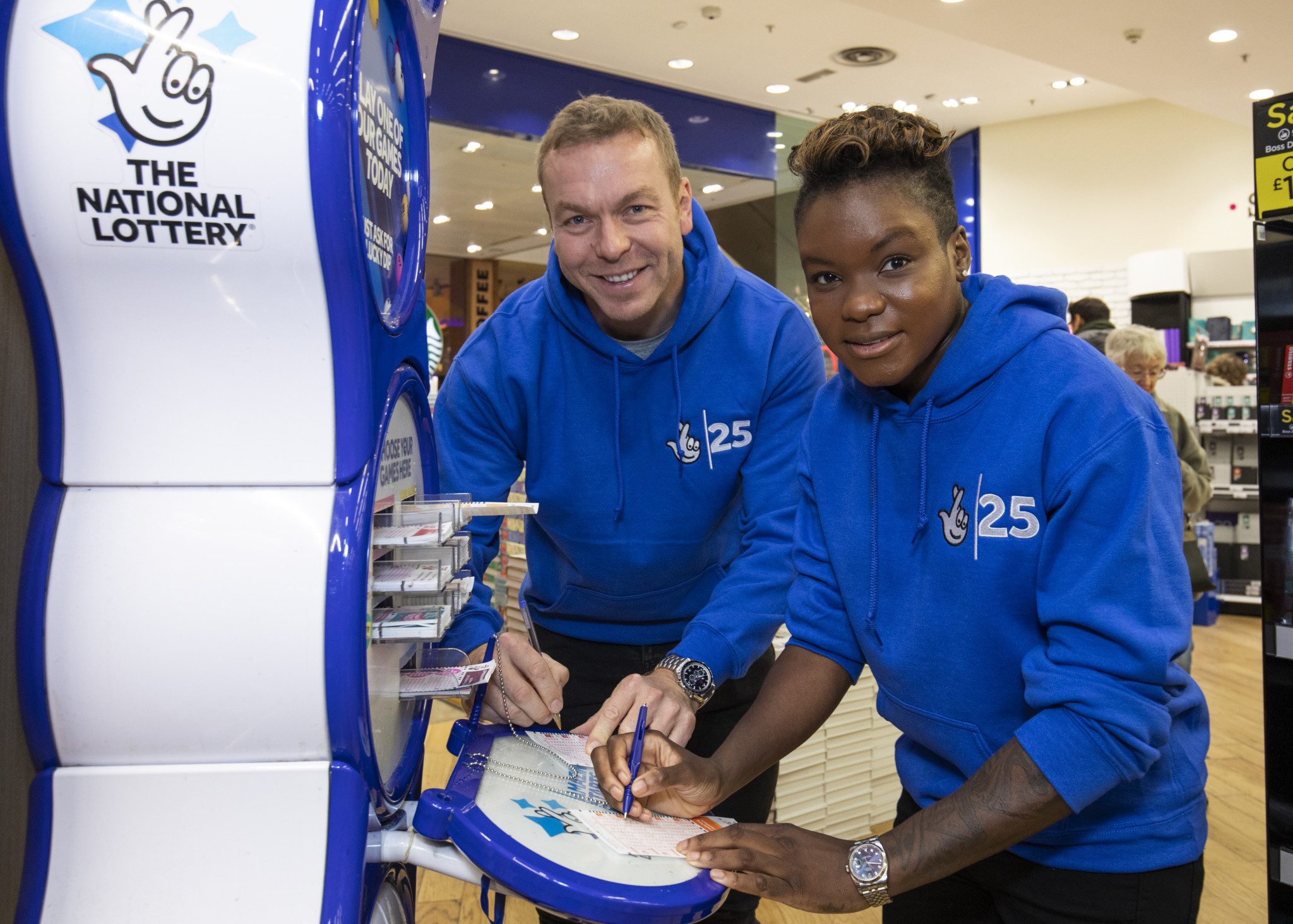 Nicola Adams, pictured here alongside Sir Chris Hoy, has had a huge effect on the popularity of female boxing in the UK ©Getty Images