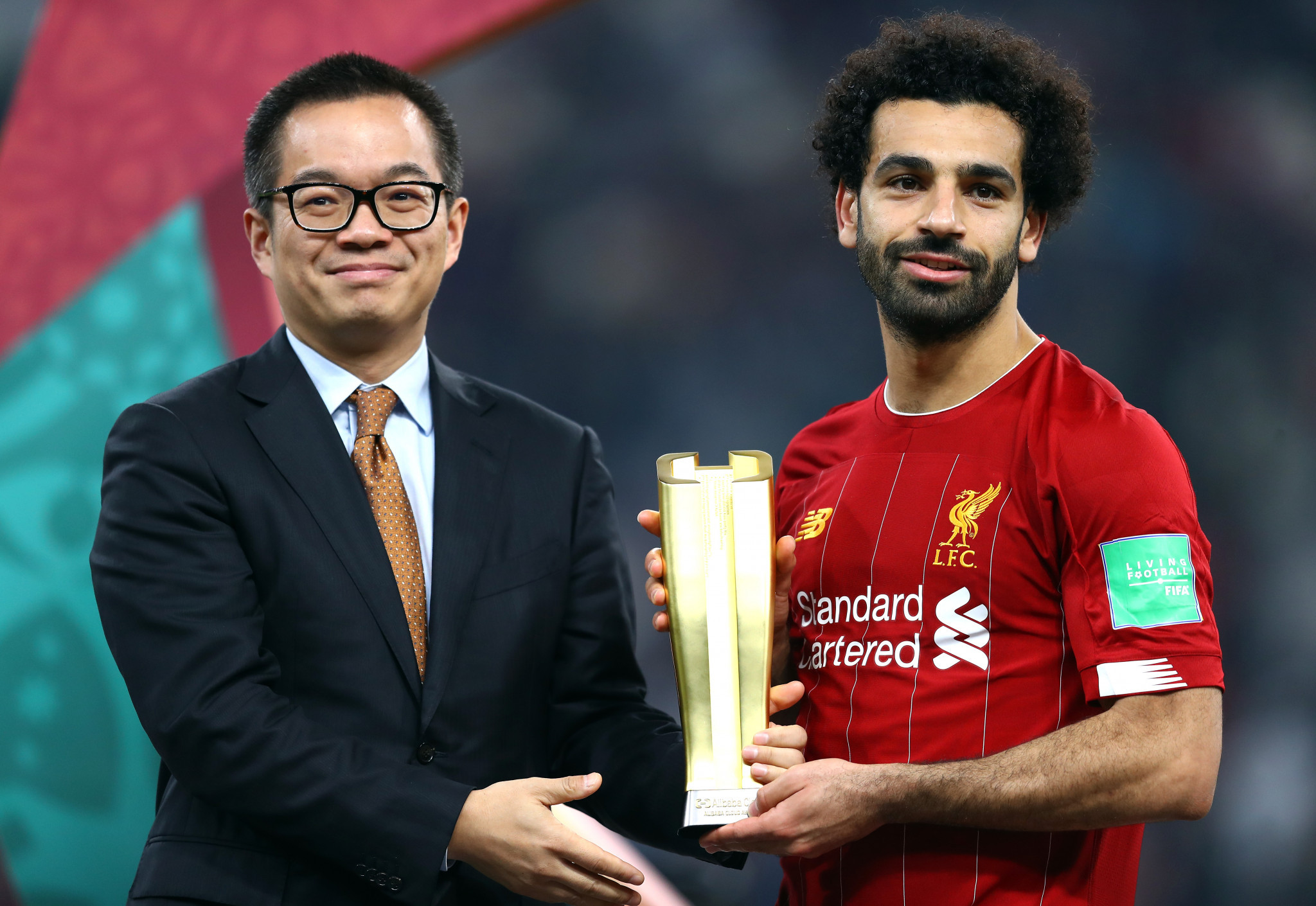 Liverpool's Mo Salah receives the Alibaba Cloud Player of the Tournament at last year's FIFA Club World Cup, showing the ambition of the company ©Getty Images