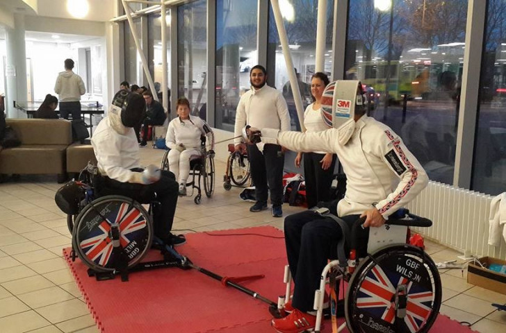 The opening of IWAS's new headquarters featured a wheelchair fencing demonstration and 
