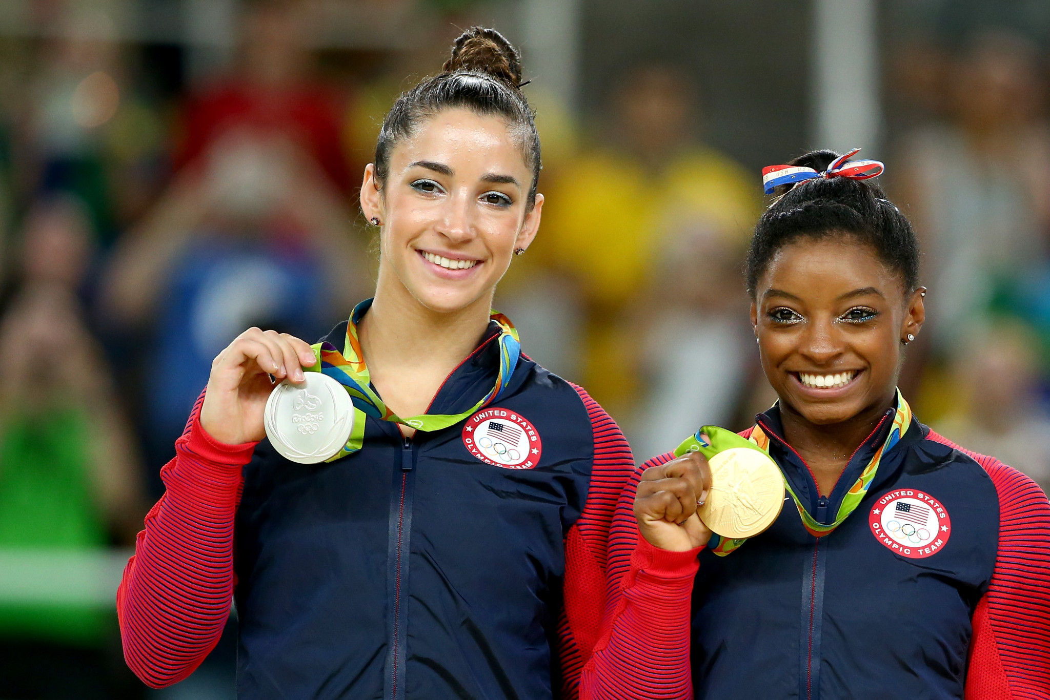 Aly Raisman, left, is a three-time Olympic gold medallist ©Getty Images