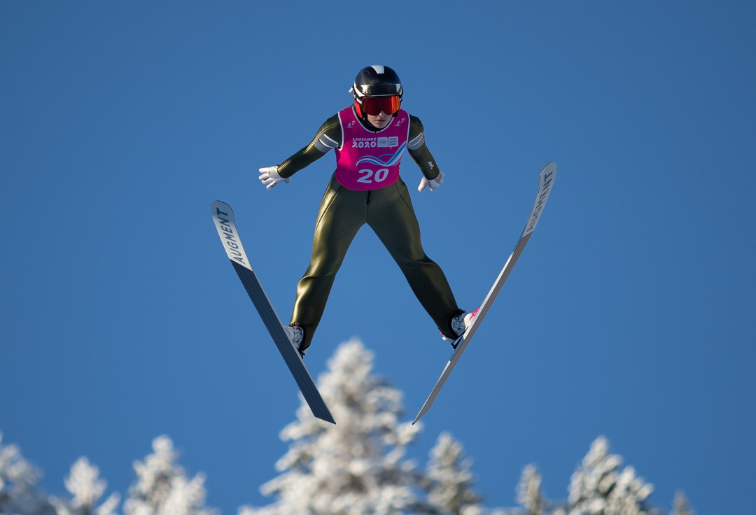 Lisa Hirner of Austria won the first Youth Olympic women's Nordic combined title ©OISphoto
