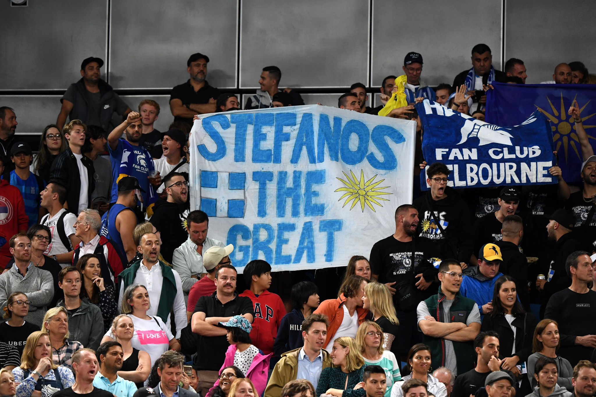 Supporters of Greece's Stefanos Tsitsipas celebrate his progression ©Getty Images