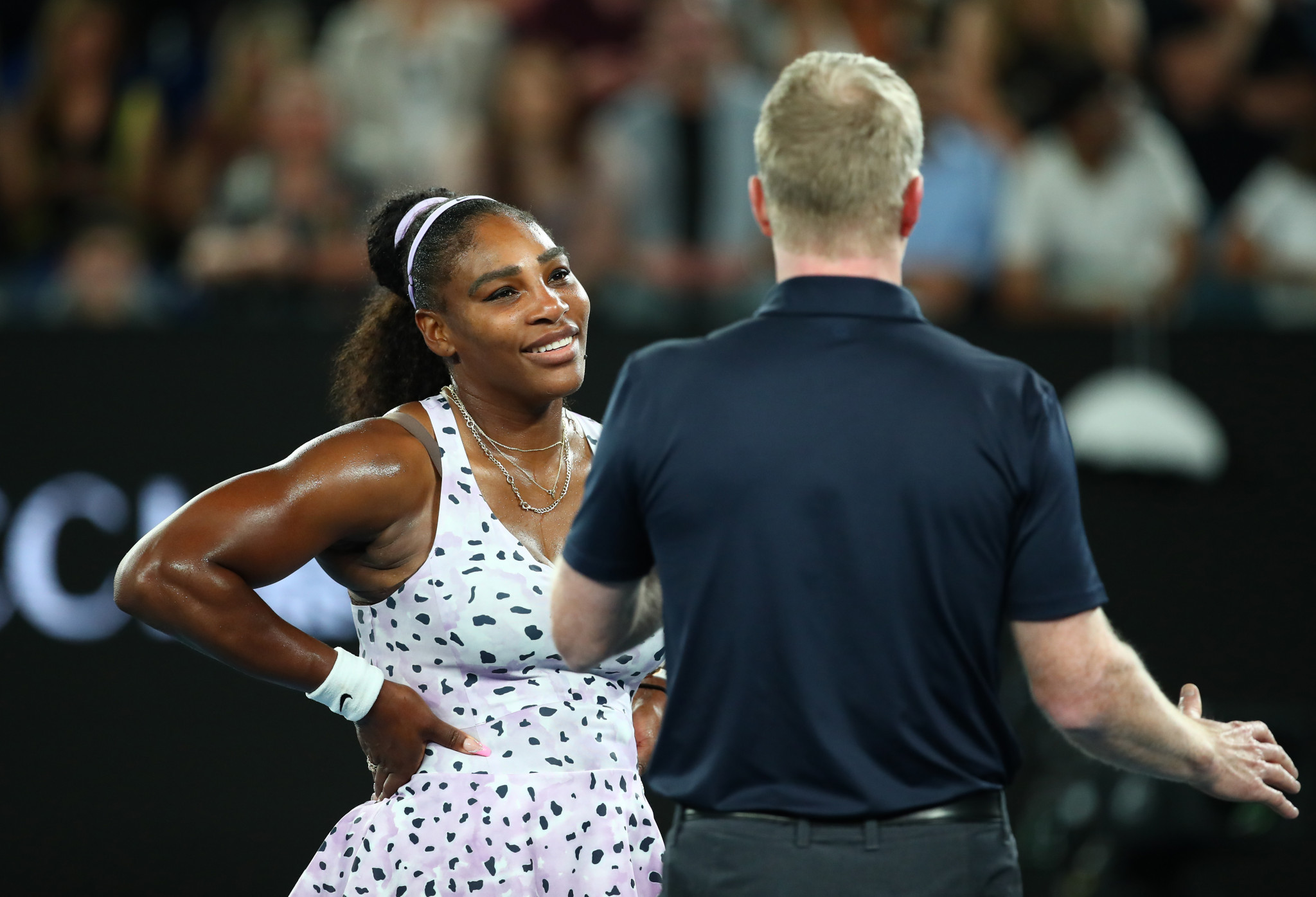 Serena Williams is interviewed by Jim Courier after going through ©Getty Images