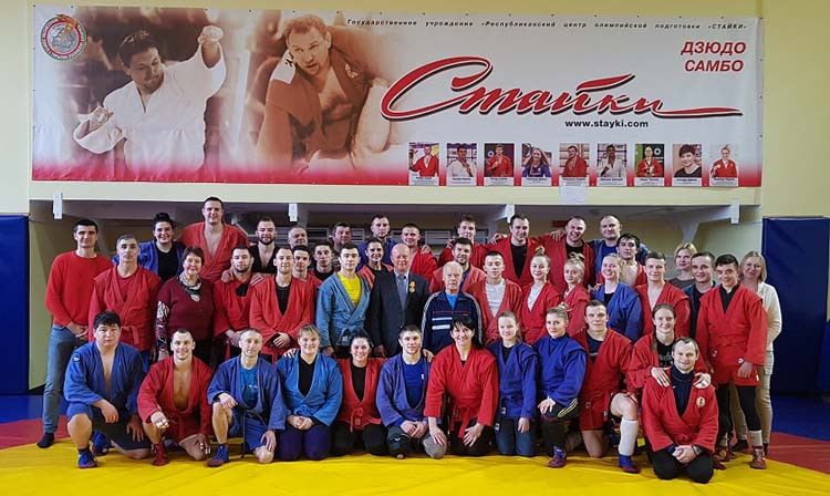 Vyacheslav Kot, centre, has led Belarus' national sambo team for 23 years ©FIAS/BelTA/www.octagon.by