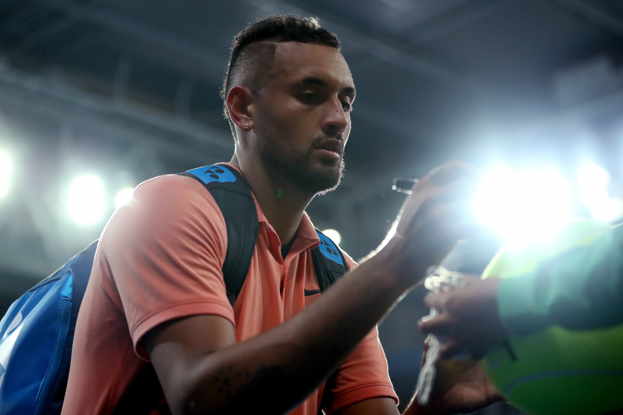 Nick Kyrgios mimicked world number one Rafael Nadal as he won his round two match in Melbourne ©Getty Images