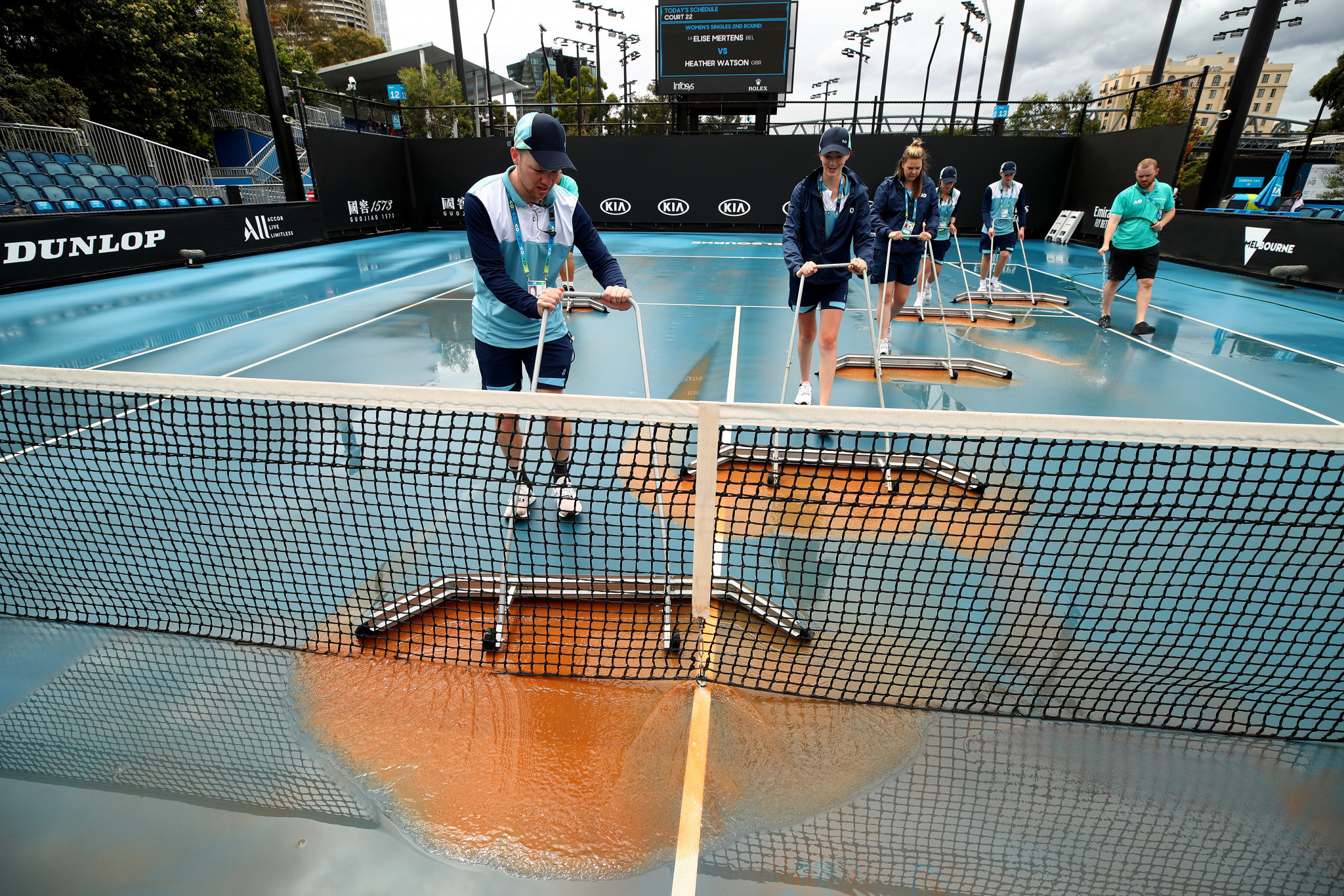 Heavy rainfall deposited dust on day four of the Australian Open, delaying play on the outside courts ©Getty Images