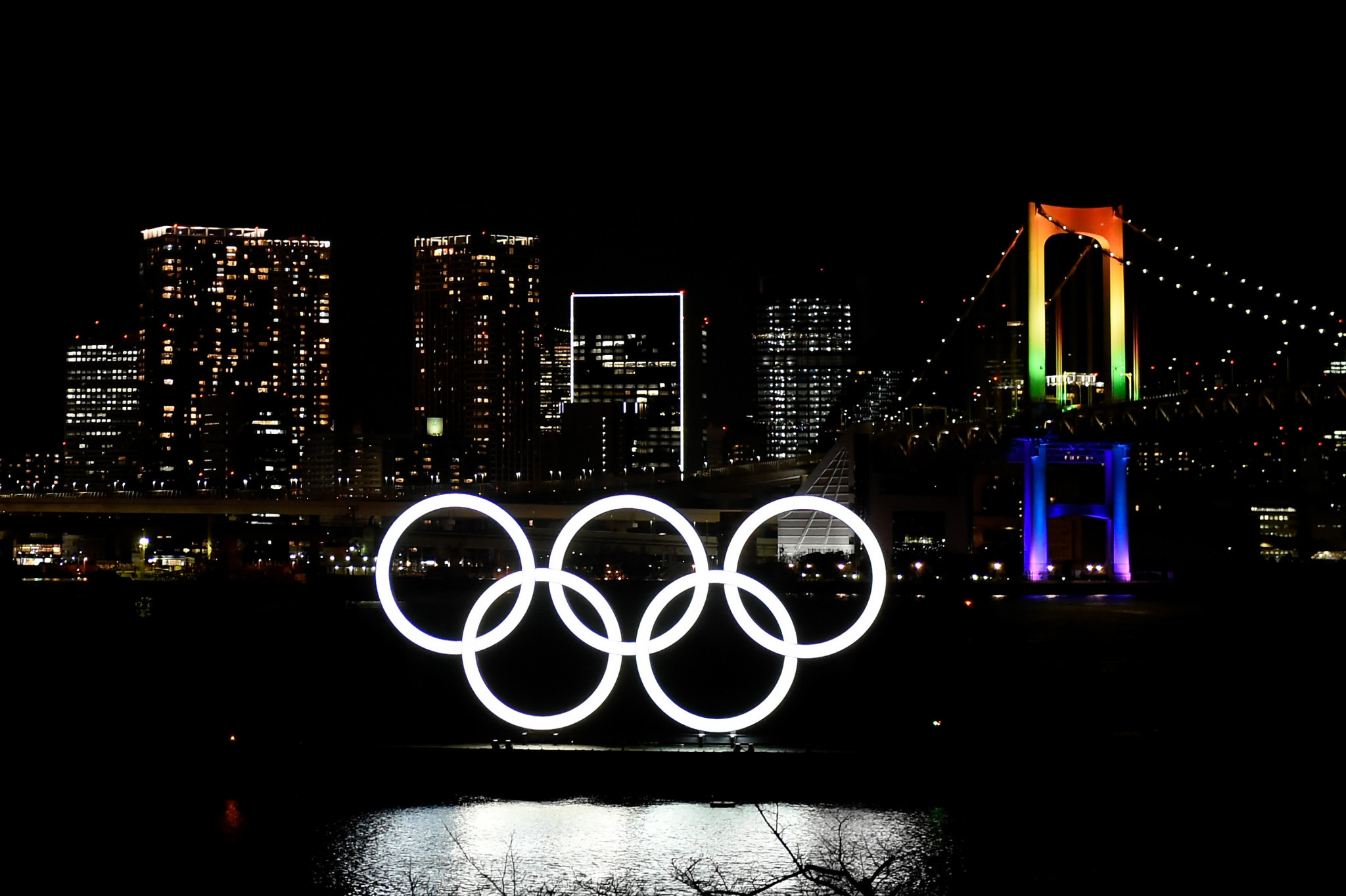 Tokyo marks six months to Olympic Games with fireworks and rings monument lighting