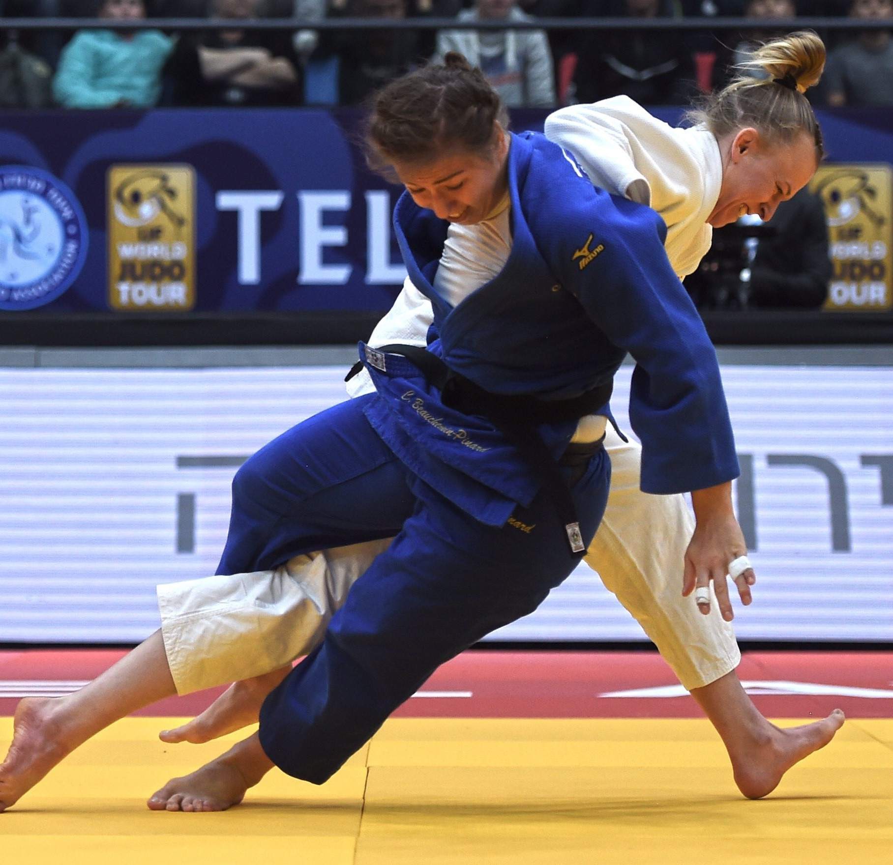 Katharina Haecker of Australia defeated Catherine Beauchemin-Pinard of Canada to win the under-63kg event ©IJF