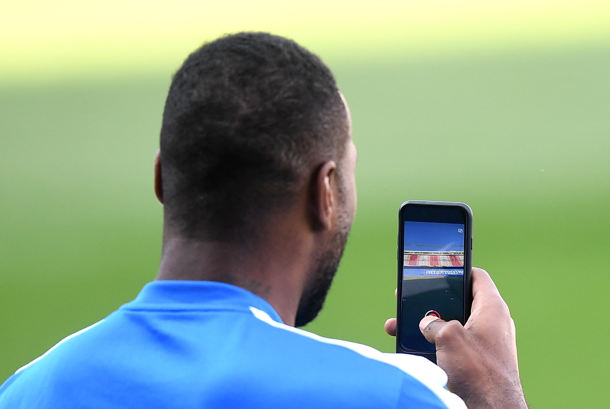 Leicester City captain Wes Morgan uses Snapchat during a training session ©Getty Images