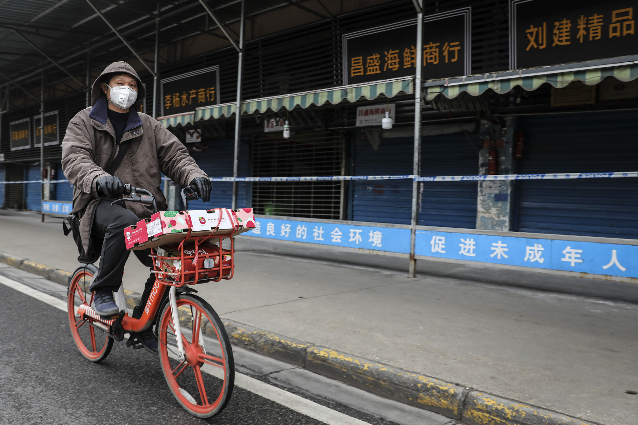 A man in Wuhan wears a mask in the initial days of the coronavirus ©Getty Images