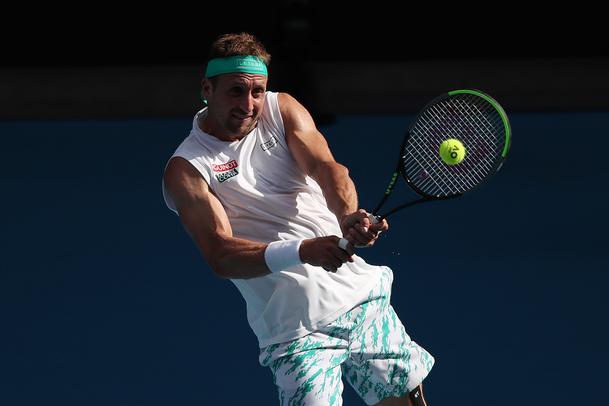  Tennys Sandgren plays a shot in his defeat to Federer  ©Getty Images