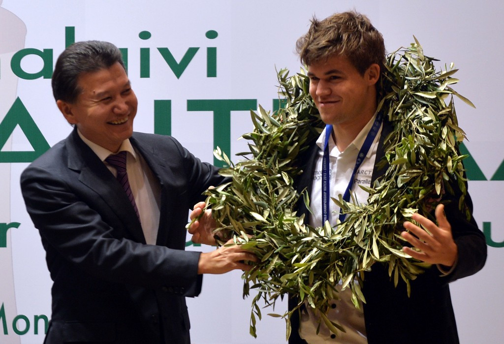 Under Kirsan Ilyumzhinov, seen here crowning new world champion, Norway's Magnus Carlsen in 2012, has become an IOC-recognised sport and is a member of the Association of ARISF ©Getty Images
