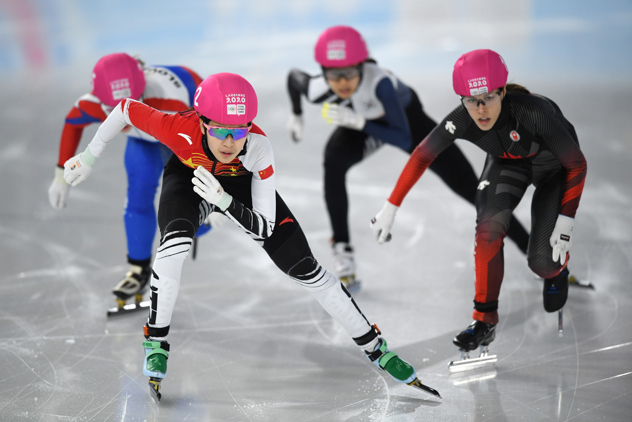 Chutong Zhang, left, leads Florence Brunelle, right, at the Winter Youth Olympics in Lausanne ©Getty Images
