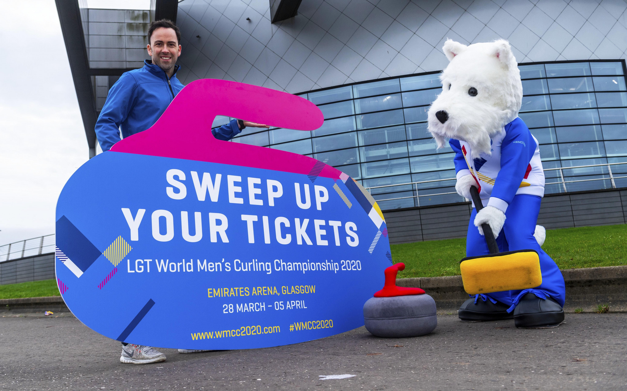 David Murdoch presenting the new mascot, Sweep, doing as the name suggests ©SNS