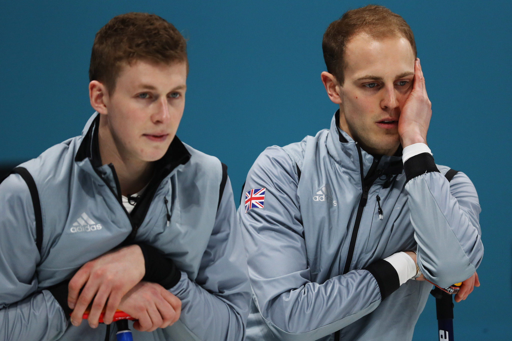 Thomas Muirhead, left, and Kyle Smith, right, competed at Pyeongchang 2018 with Smith as skip, but will now play second and third for Thomas' older brother Glen, at the Scottish Championships ©Getty Images