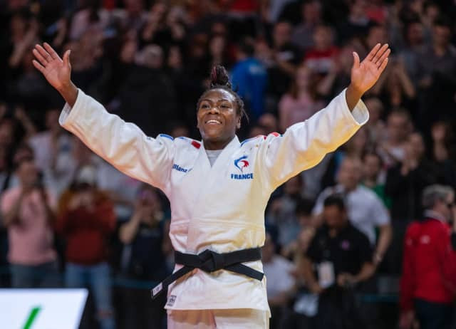 Clarisse Agbegnenou acknowledges the reaction of the 14,000 sell-out crowd after winning the women's under-63kg gold medal at the IJF Paris Grand Slam ©IJF