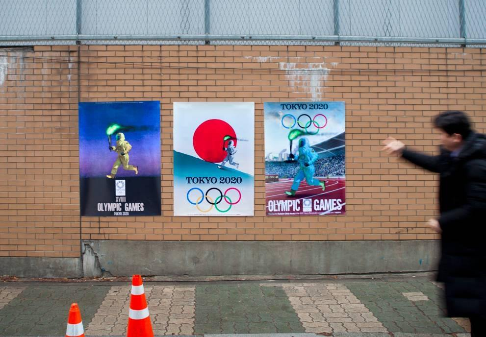 The posters were created by a South Korean group depicting a torchbearer wearing a radiation suit ©Facebook/VANK