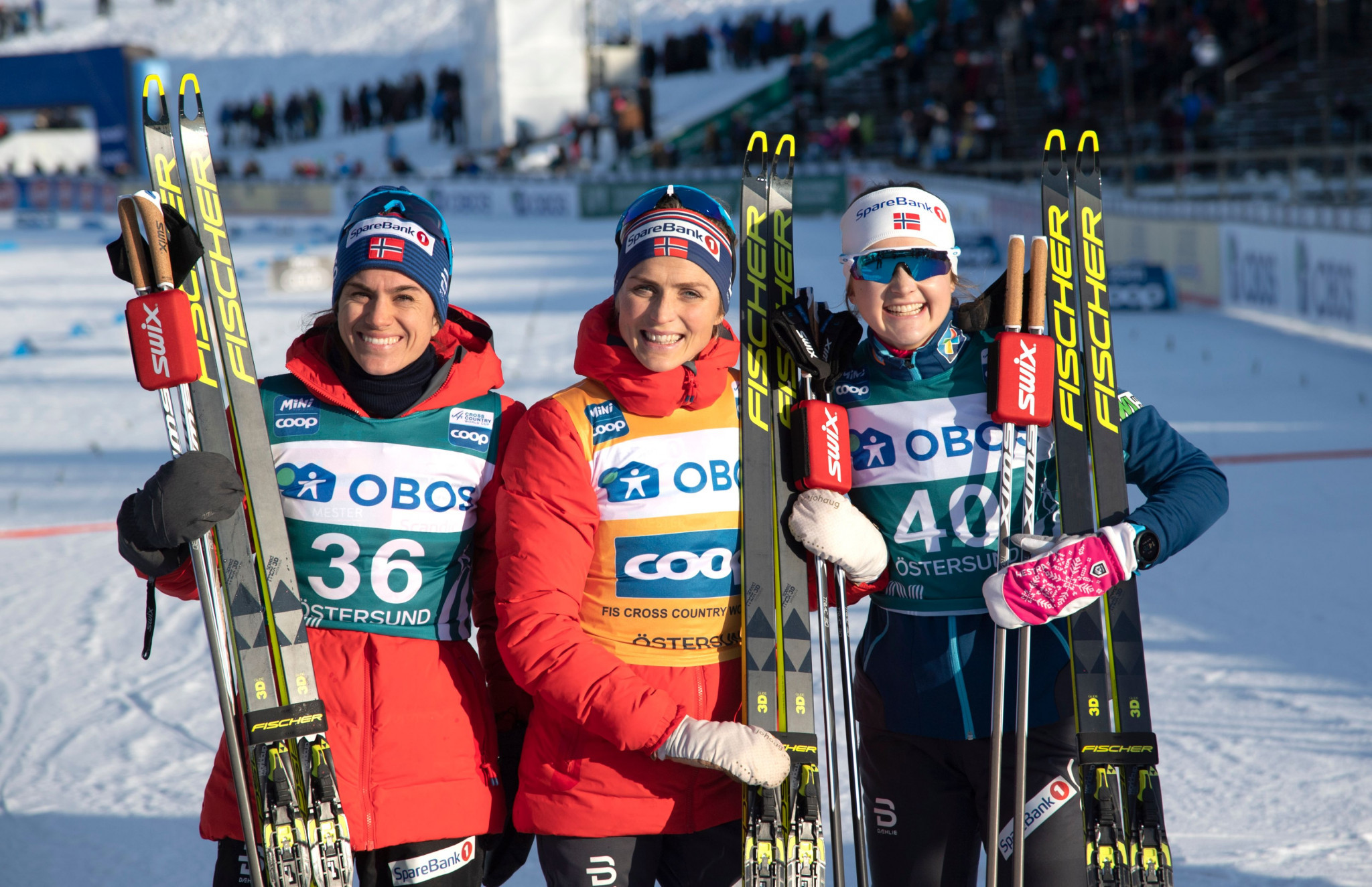 Norwegian trio Therese Johaug, centre, second place Heidi Weng, left, and Ingvild Flugstad Østberg, right produced the same World Cup podium two days in a row ©Getty Images