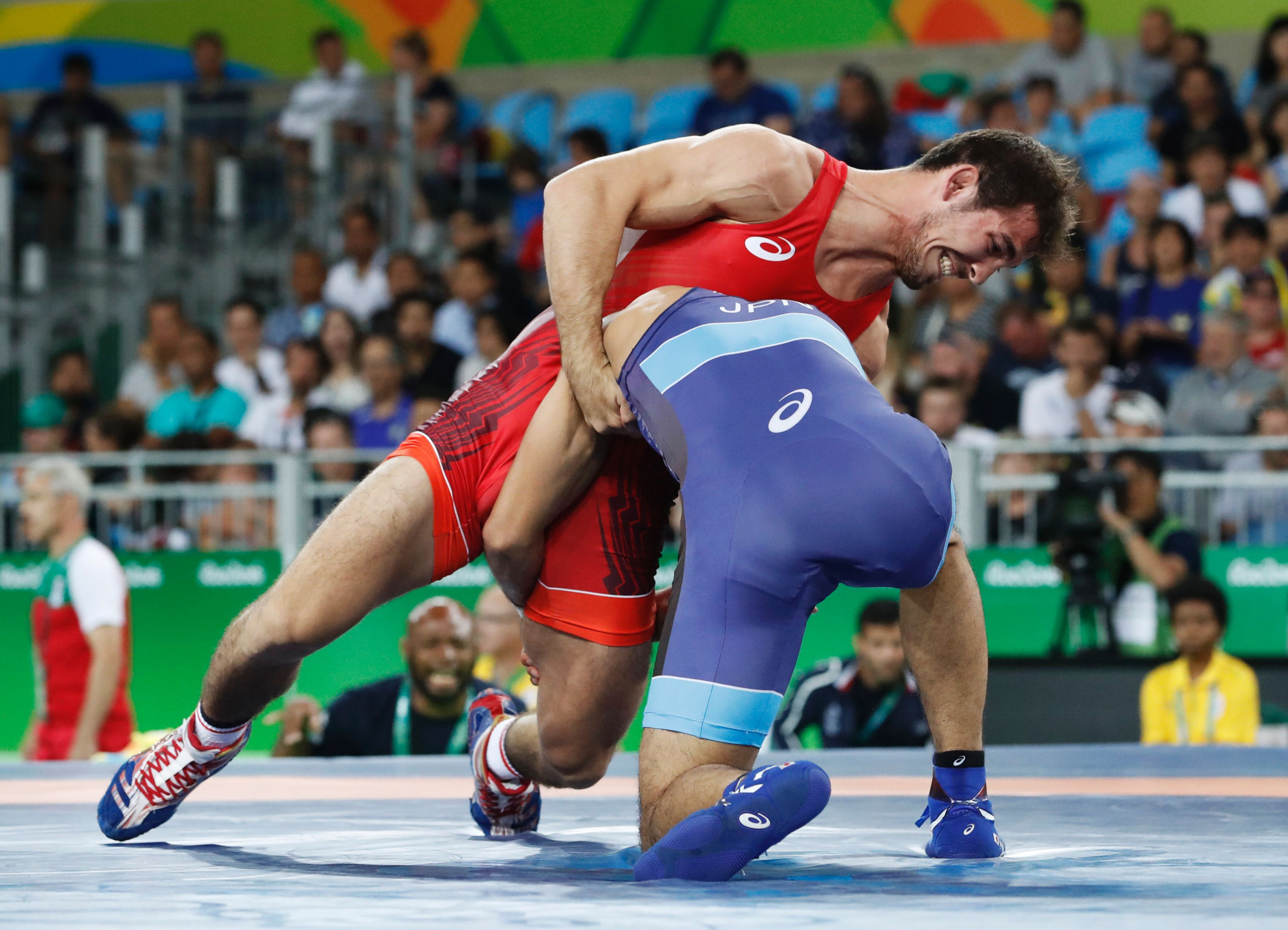 France's Zelimkhan Khadjiev, in red, is one of three wrestlers to have lost their place at Tokyo 2020 due to an anti-doping violation ©Getty Images