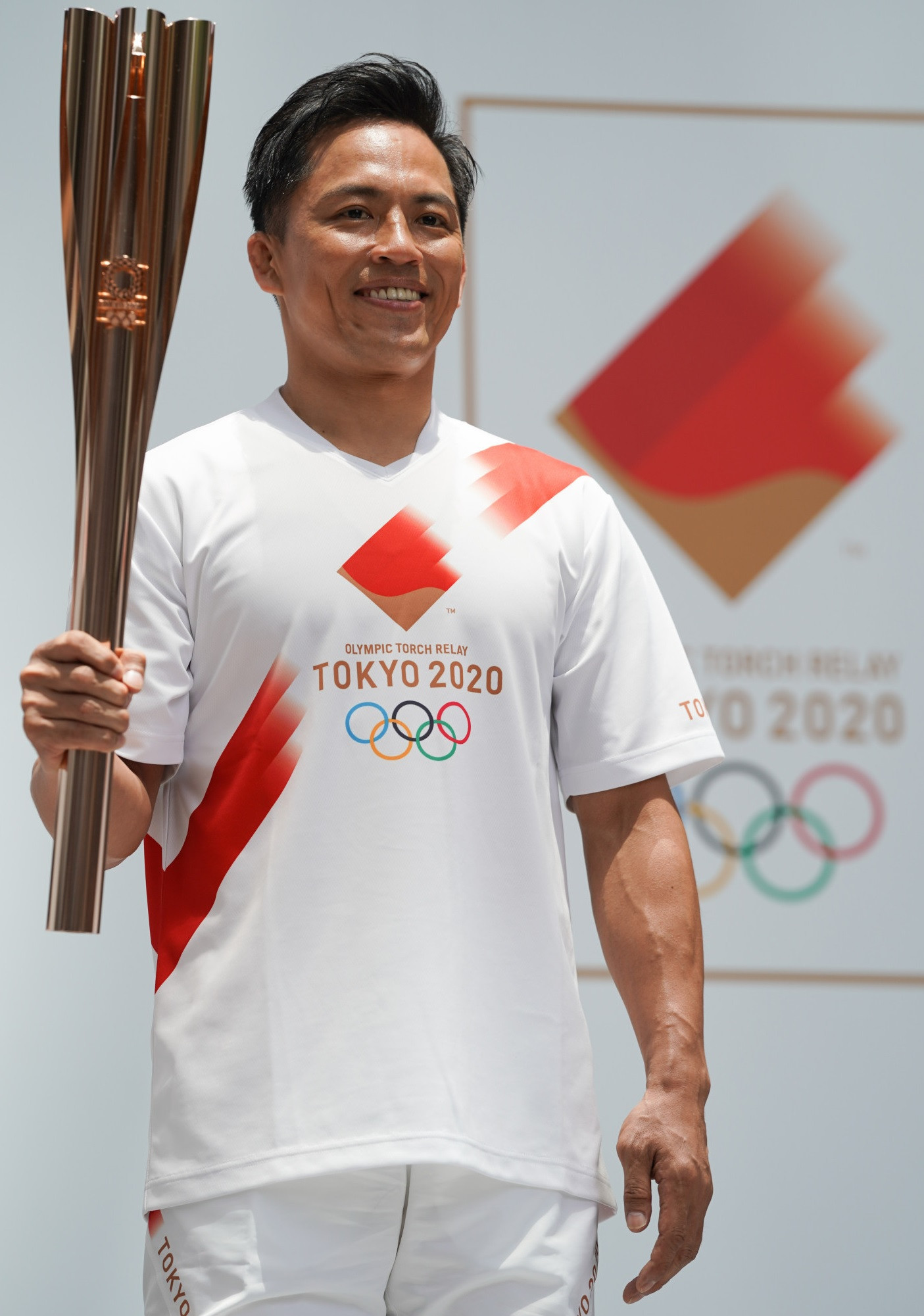 Judoka Tadahiro Nomura is playing his part in bringing the Olympic flame to Tokyo ©Getty Images