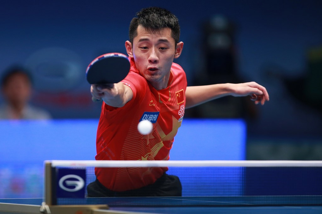 Olympic champion Zhang Jike claimed victory in his opening match over Lee Sangsu