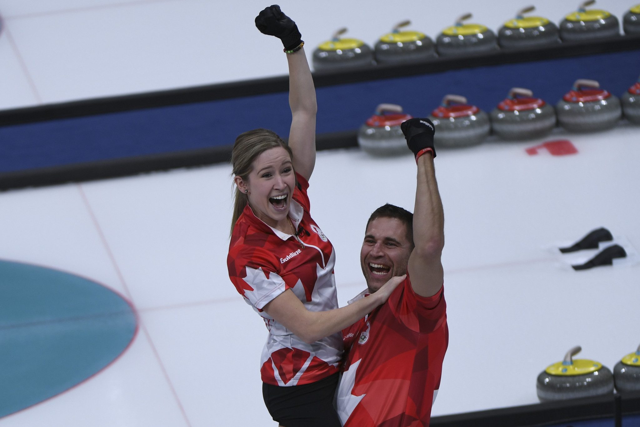 John Morris celebrating with team-mate Kaitlyn Lawes after their Olympic win ©Getty Images