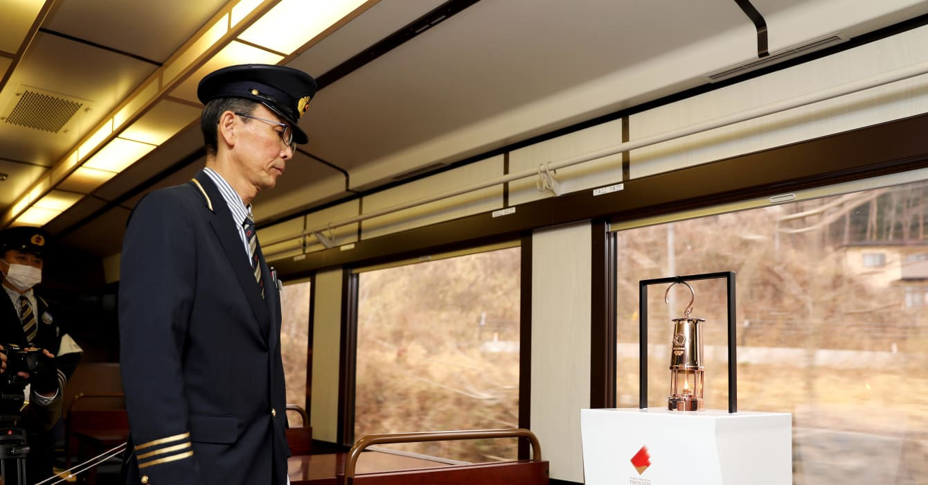 The Flame travelled by rail in the disaster-hit Fukushima region ©Tokyo 2020