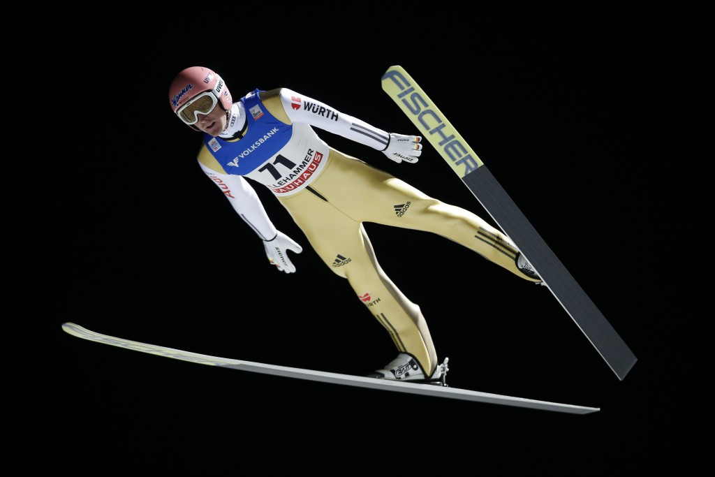 Severin Freund earned victory in the men's event to extend his World Cup lead
