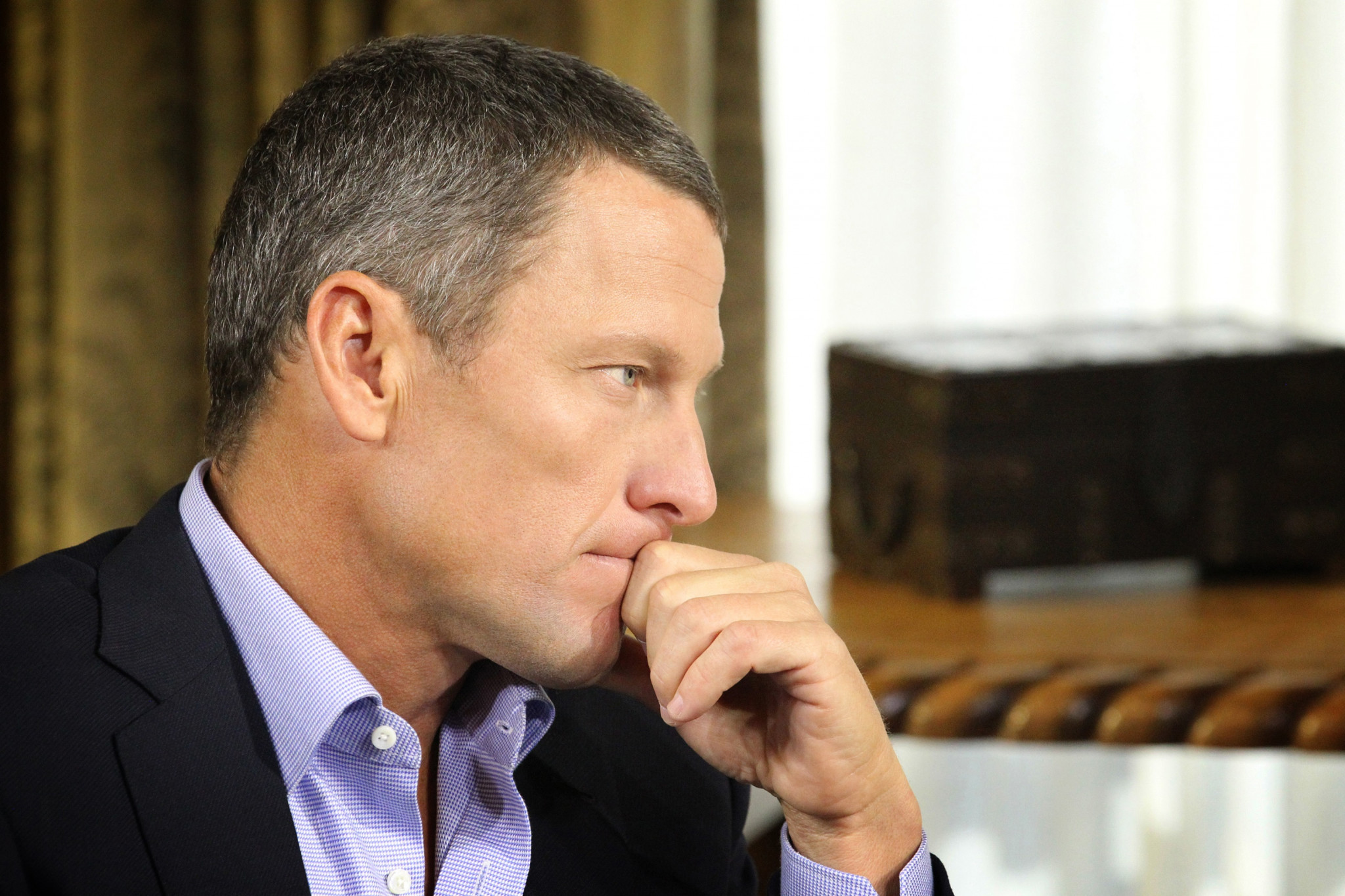 Disgraced cyclist Lance Armstrong admits doping may have caused testicular cancer