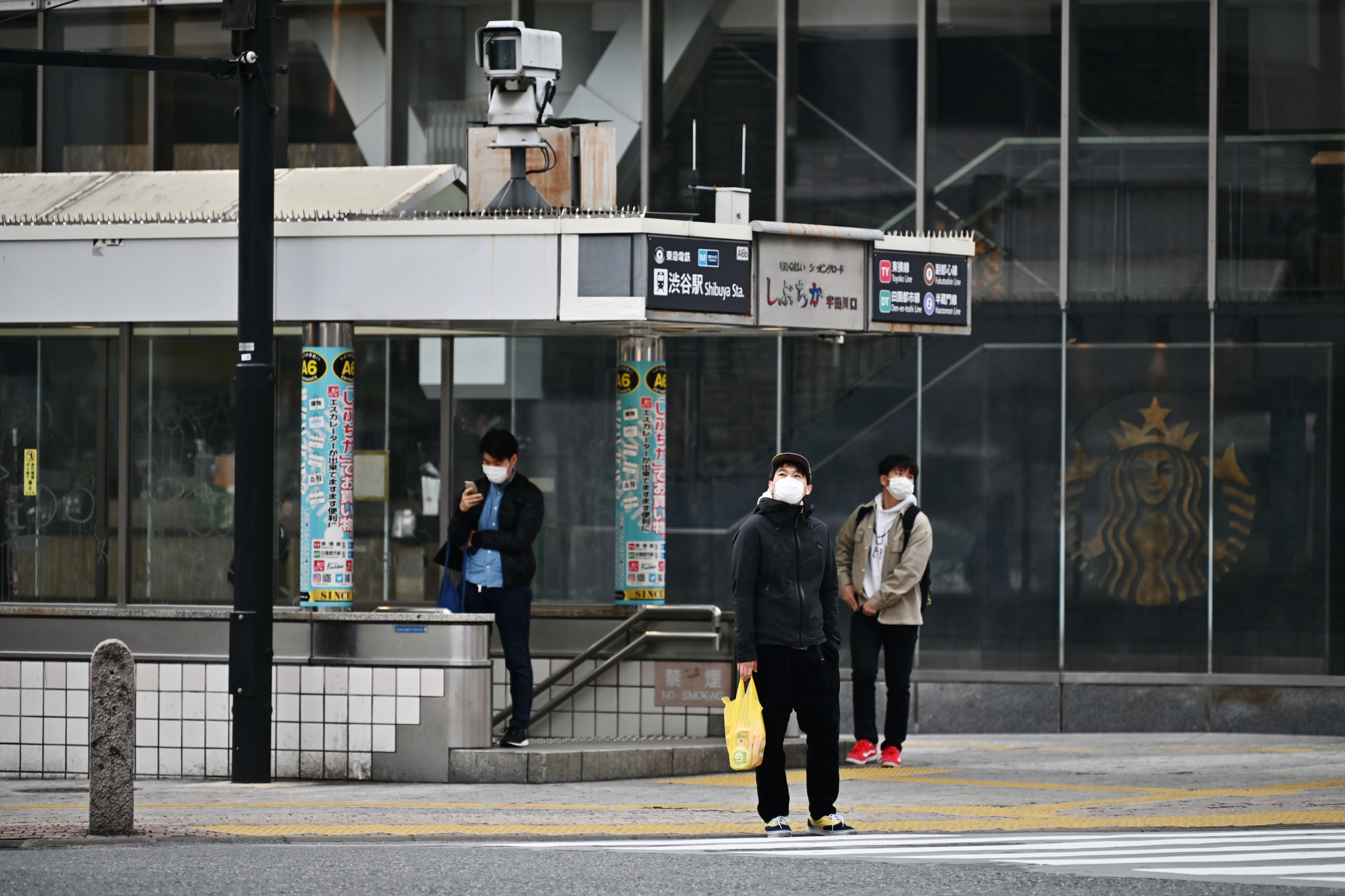 People wear masks in Tokyo, where coronavirus cases are on the rise ©Getty Images