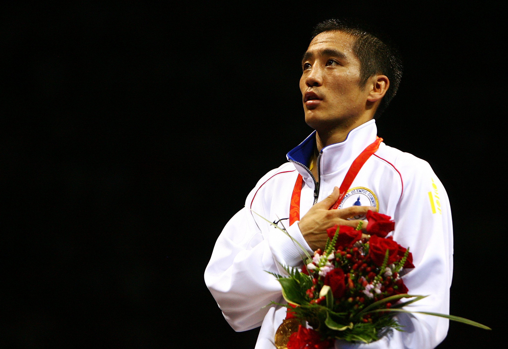 Mongolia's first Olympic gold medallist Enkhbat Badar-Uugan attended the signing ceremony ©Getty Images