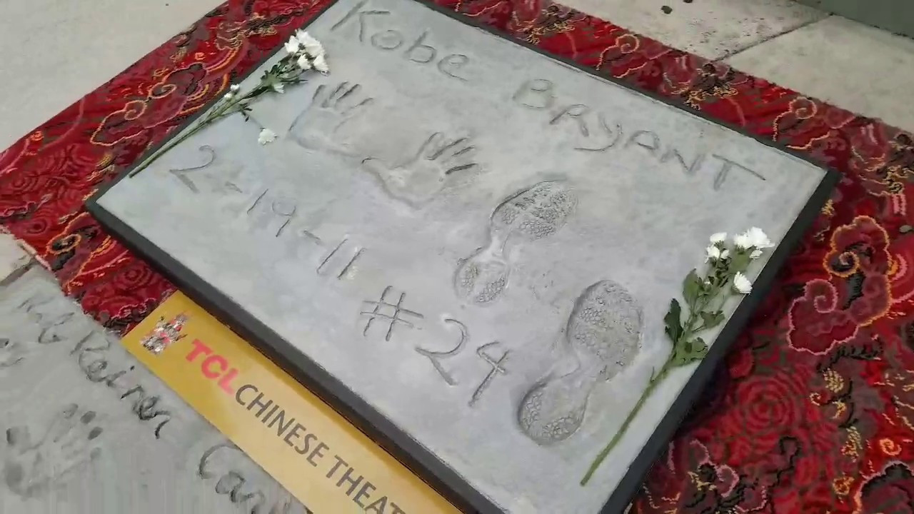 Bryant concrete handprints sell for $75,000 at auction