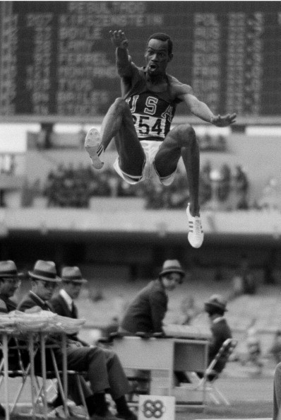 Bob Beamon, pictured winning the Mexico Olympic long jump title in a massive world record of 8.90m, showed his support for the Smith and Carlos protest by wearing black socks at his medal ceremony ©Getty Images