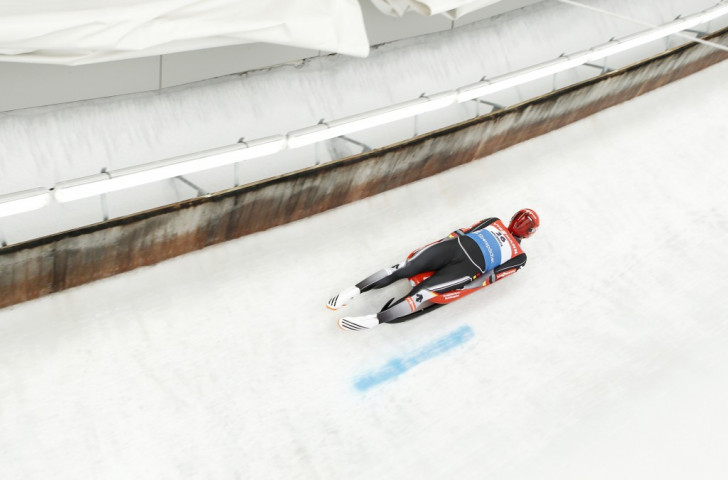 Germany's Felix Loch won the men's sprint event to edge up to third place in the Luge World Cup rankings
