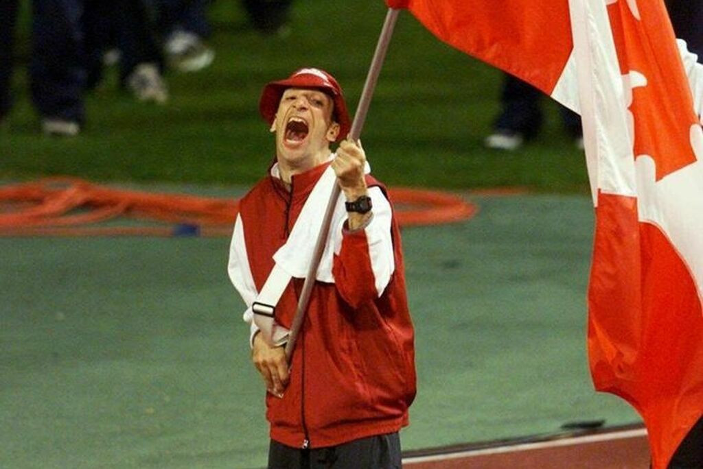 Canada's Sydney 2000 Paralympic flag-bearer Longhi dies at 56