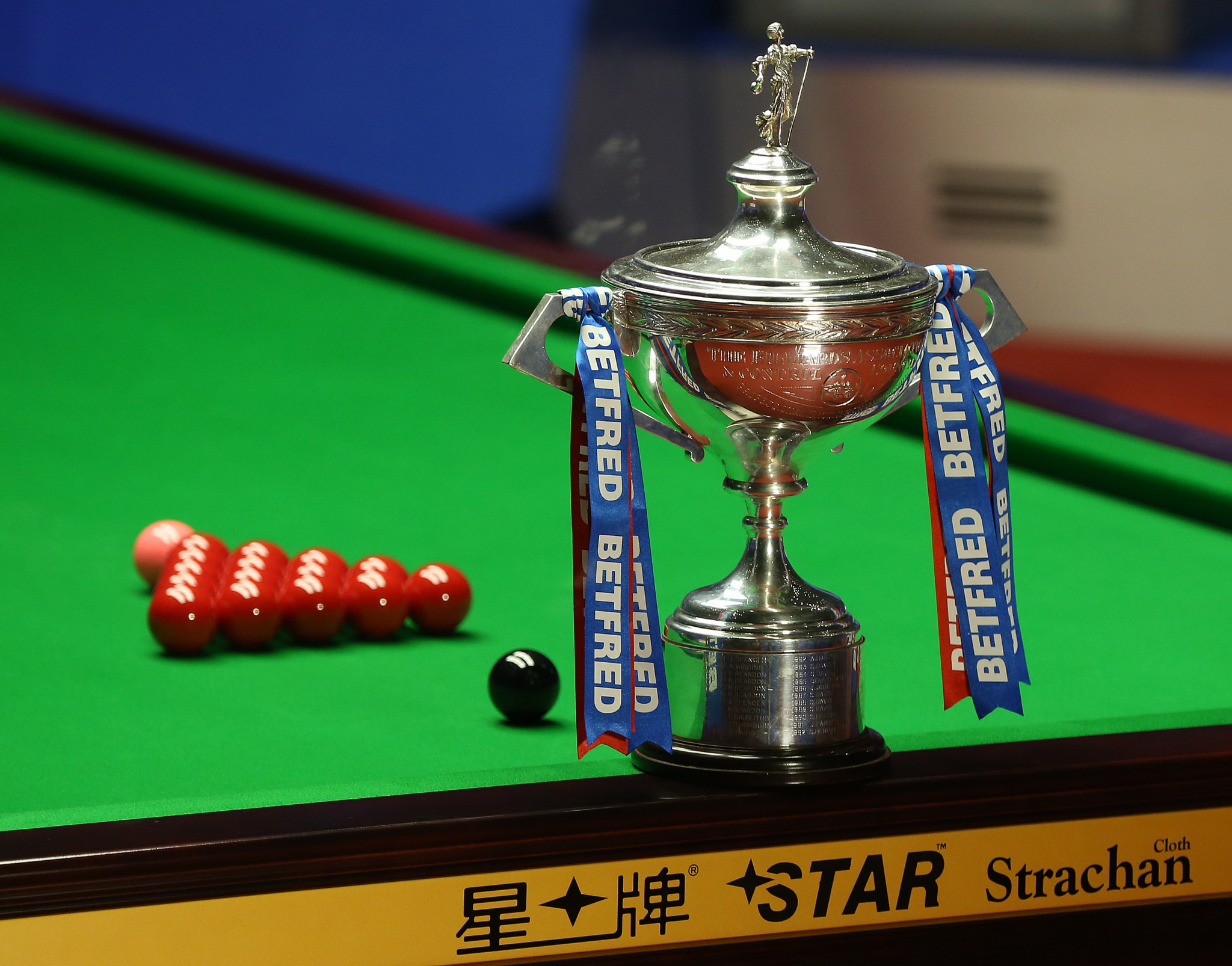 No fans at World Snooker Championship from day two as defending champion Trump advances on opening day