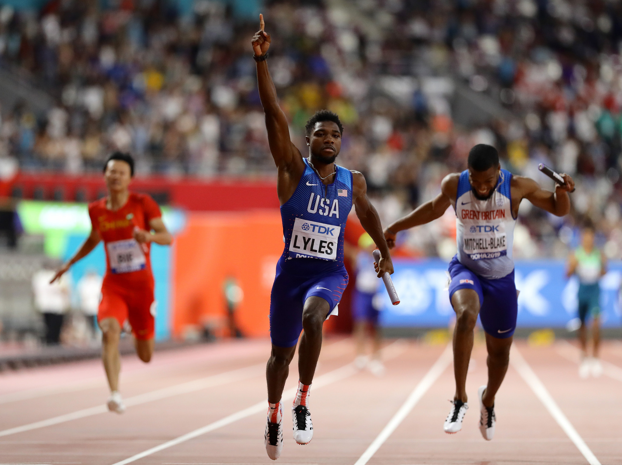 Noah Lyles brings home the baton to earn the United States 4x100m gold at last year's World Athletics Championships, where he also won the 200m title ©Getty Images