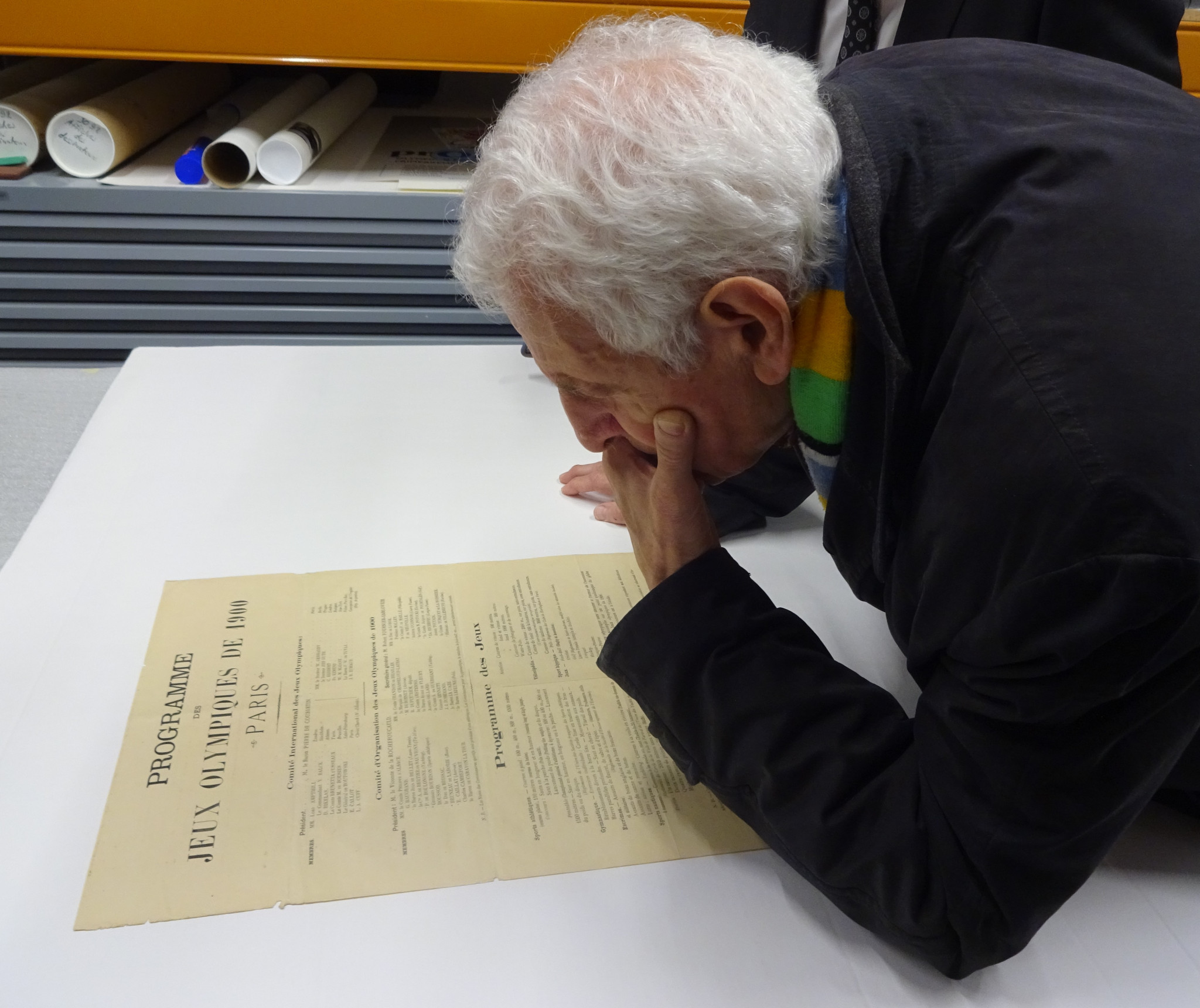French historian Jean Durry studies the document showing that Pierre de Coubertin wanted the first modern Olympics in Paris in 1900 ©Philip Barker