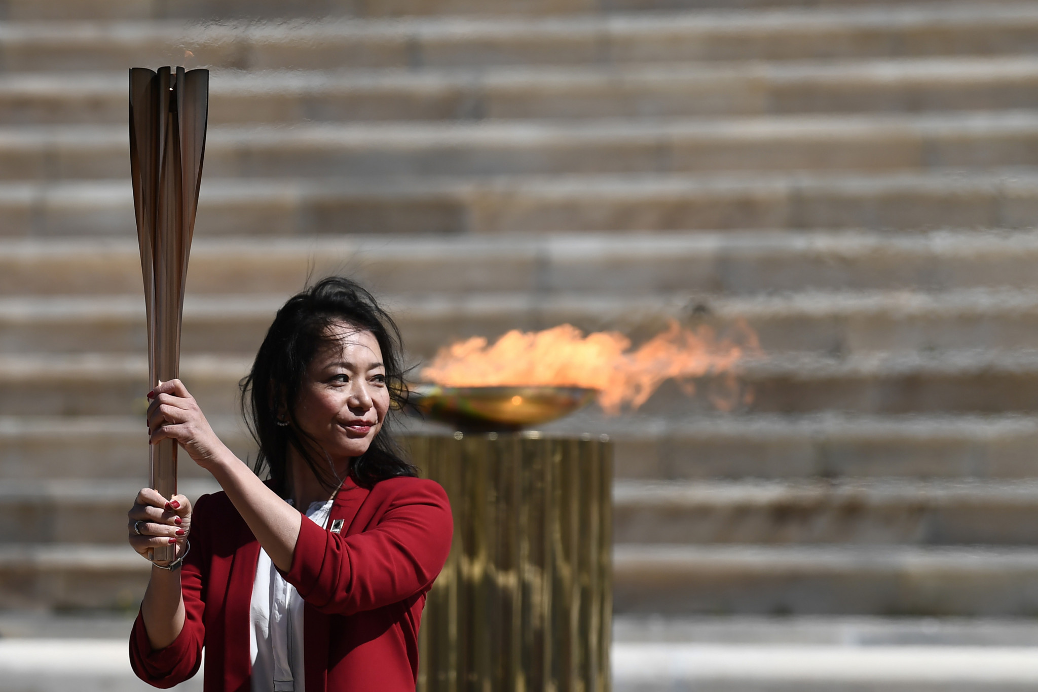 Naoko Imoto received the Olympic Flame on Tokyo 2020's behalf ©Getty Images