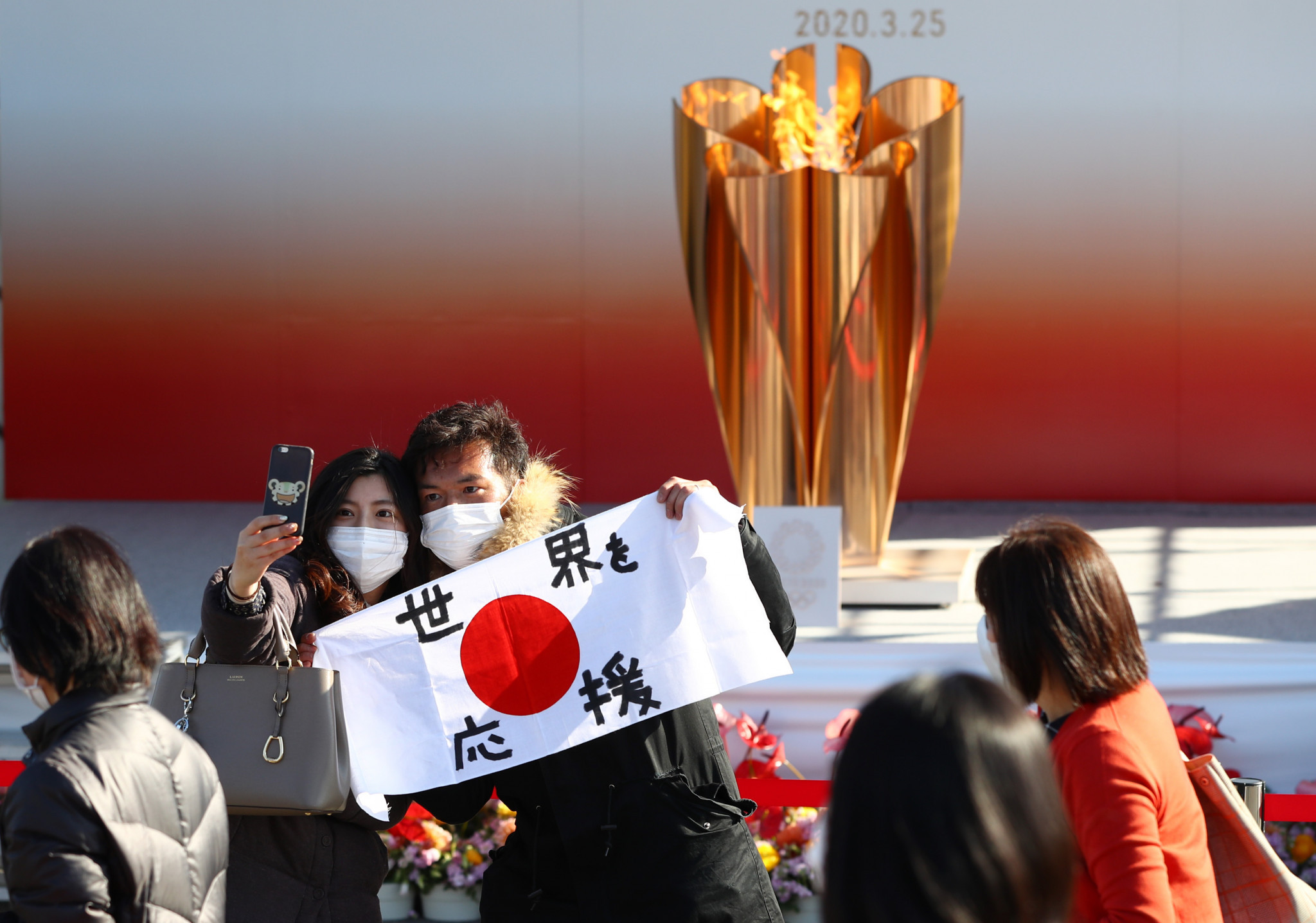 The Olympic Flame proved popular after arriving in Japan earlier this year ©Getty Images
