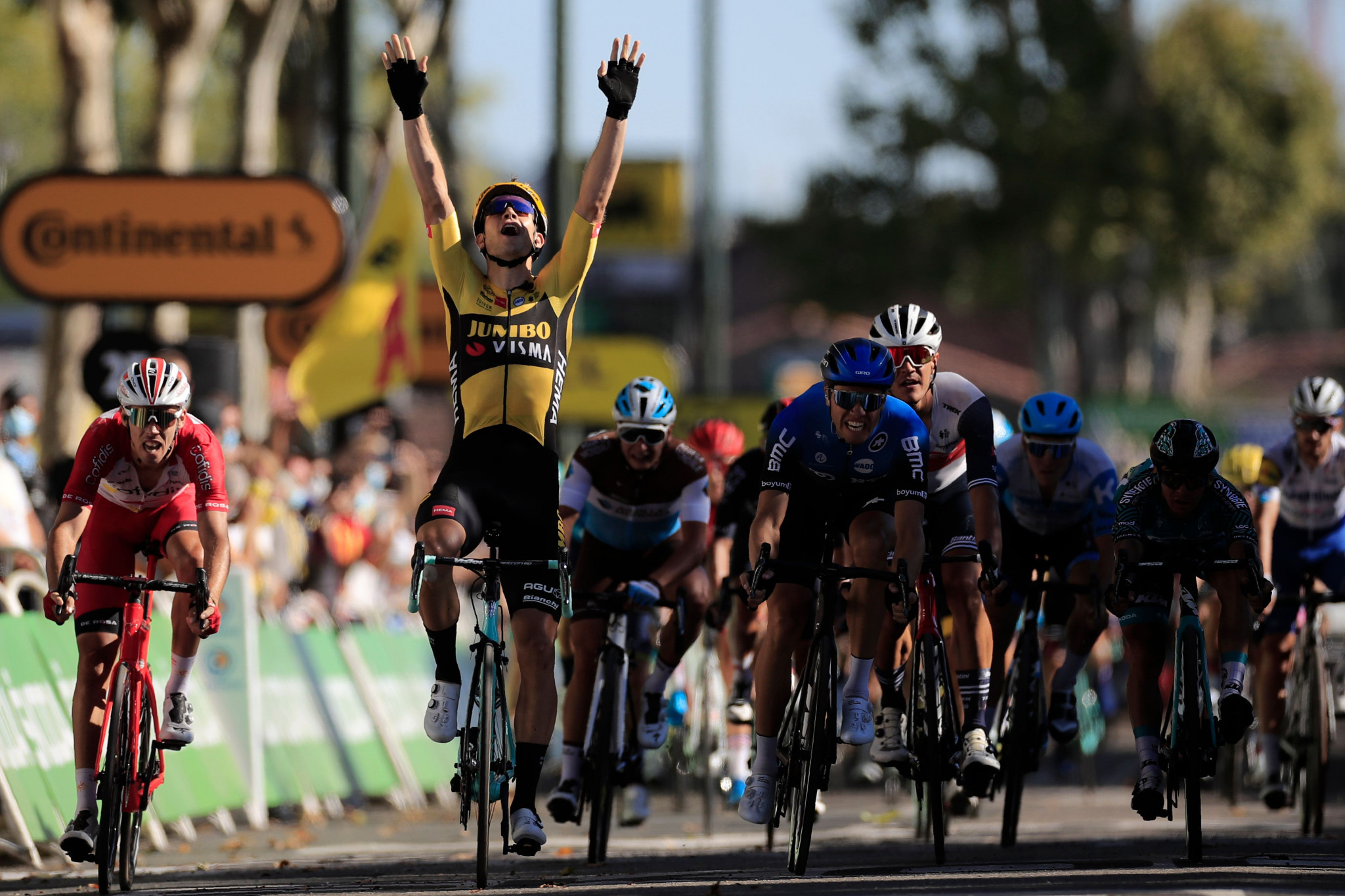 Van Aert clinches second stage win as Pogačar loses time at Tour de France