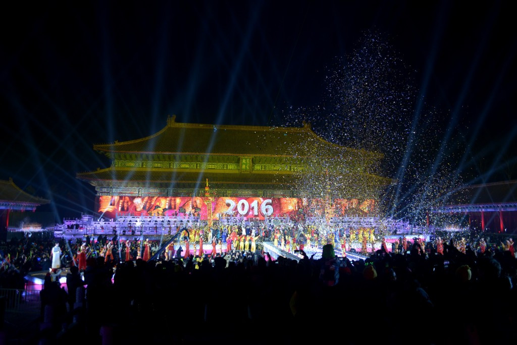 People cheer during a New Year's Eve countdown event at the Tai Miao Temple next to the Forbidden City in Beijing, which hosted the 2008 Summer Olympics and in 2022 is due to hold the Winter Olympics and Paralympics, making it the first city to stage both events ©Getty Images