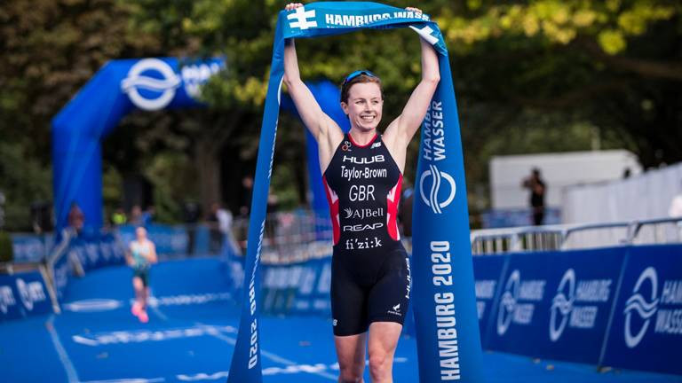 Britain's Georgina Taylor-Brown, who had never previously finished higher than third in a World Triathlon Series event, celebrates becoming world champion in Hamburg ©World Triathlon
