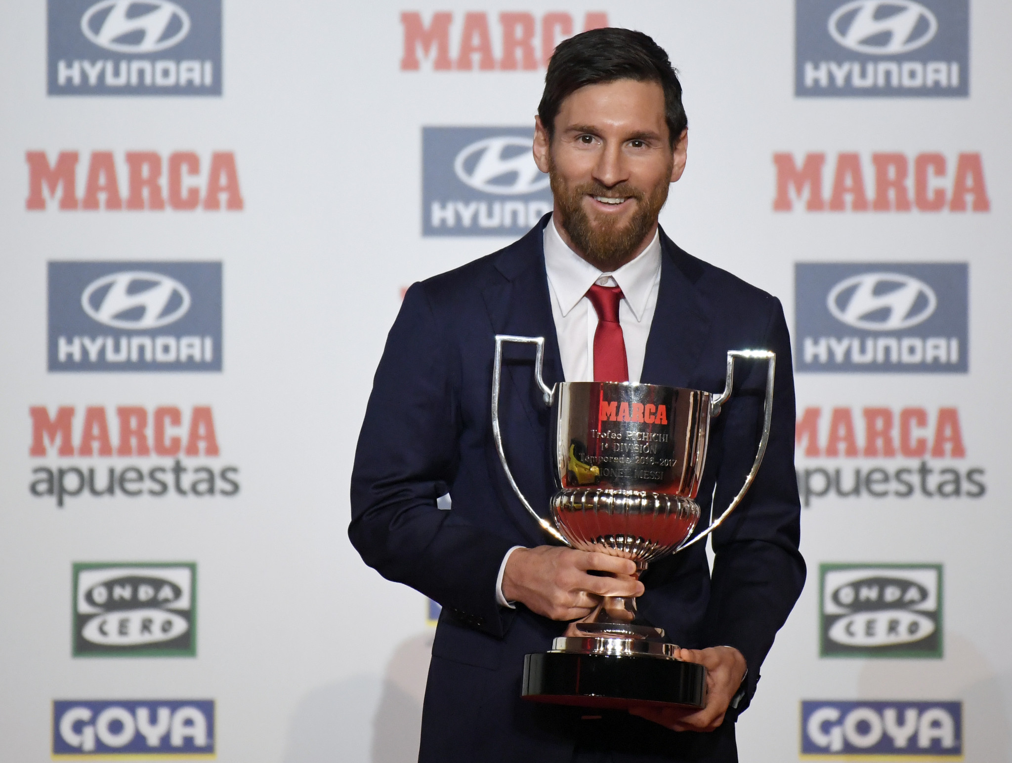 Lionel Messi poses with the Pichichi Trophy, awarded to La Liga's top scorer ©Getty Images
